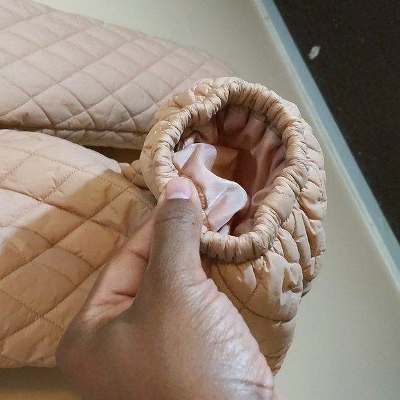 Sela| Tan Unisex Onesie Snowsuit buttoned and zippered with zippered pockets - Picture 9 of 13